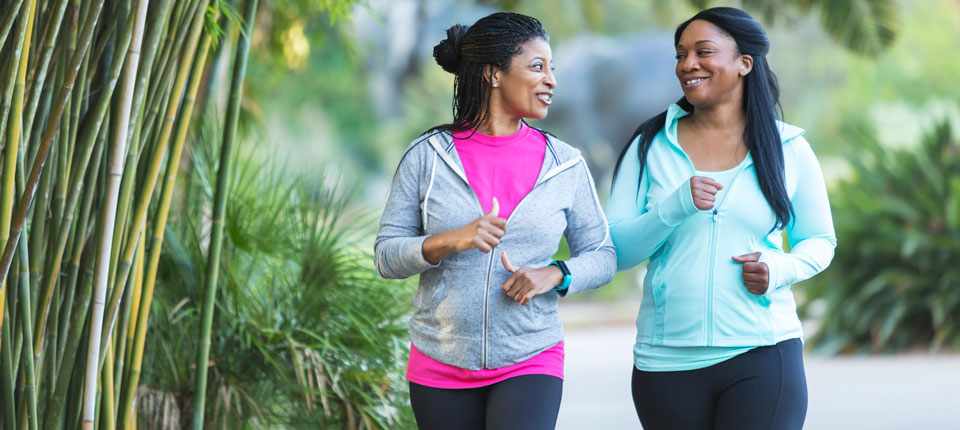 Two women jogging together