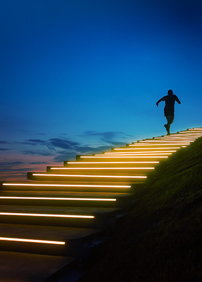 A man running up the stairs 